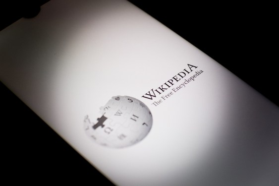 Wikipedia logo with puzzle globe and text 'Wikipedia The Free Encyclopedia'