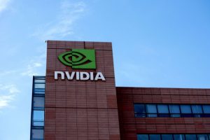 NVIDIA building with logo and name on red brick exterior against blue sky