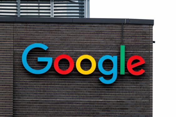 Google logo on a building displaying colorful blue, red, yellow, and green letters