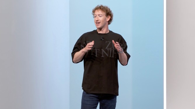 Person speaking on stage about Meta Unveils Llama API to Propel AI Innovation