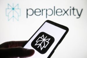 Smartphone displaying an AI-powered app icon with a geometric logo, with the Perplexity logo and name in the background illustrating innovative report and dashboard creation